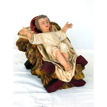mittelgroßes liegendes Jesuskind in Krippe verkleinert