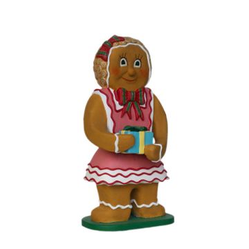 Lebkuchen-Mädchen mit Geschenk vergrößert