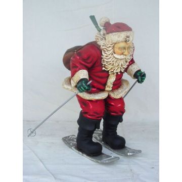 Weihnachtsmann auf Skier klein verkleinert