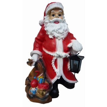 kleiner Weihnachtsmann mit Laterne  verkleinert