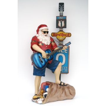 Weihnachtsmann in Sommeroutfit mit Gitarre verkleinert